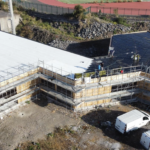 Coibentazione del tetto piano di un’istituto pubblico in XLAM a Catania